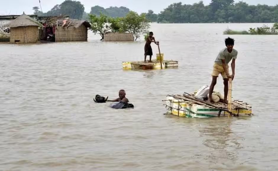 Villagers use makeshift rafts to cross floodwater, Bihar